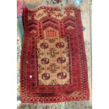 Silk prayer rug showing animals, with a central ca