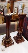 Pair stained wood and brass table lamps, each square section with pierced borders, quadruple
