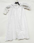 Four various cotton christening gowns and petticoa