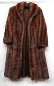 Brown mink coat with shawl collar, embroidered lining, bell sleeves