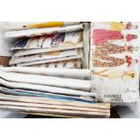 Large quantity of dress patterns including Vogue, Butterick, Simplicity, etc and a basket containing