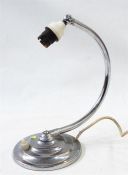 1930's chrome table lamp with curved arm on panelled circular base, 27cm high