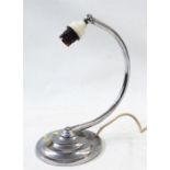 1930's chrome table lamp with curved arm on panelled circular base, 27cm high