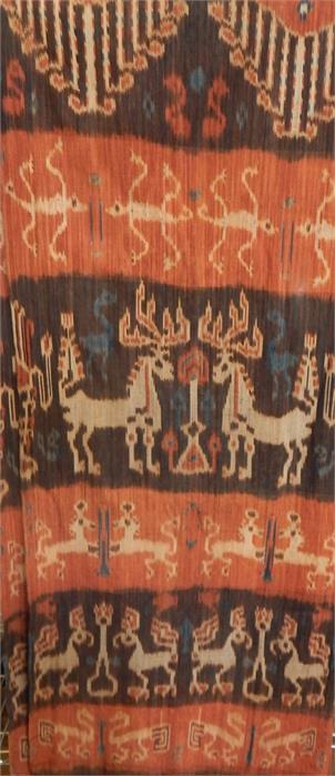 Indonesian Sumba woven hanging decorated with stylised animals and figure motifs, in cream, blue and