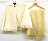 Vintage mohair short cape with single brass button fastening, fringe to the sleeves and hem, two