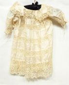 Four cream silk and lace short baby gowns includin