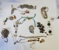 Quantity of costume jewellery to include beaded necklaces, coral necklace, jet coloured necklace,