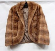 Short blonde mink jacket with bell sleeves, shawl collar