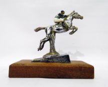 Enamelled and chronium metal horse and jockey car mascot, on wooden base, the mascot 15cm high