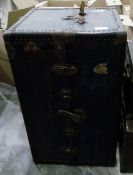 Large metal cabin trunk with hanging compartment and drawers, another metal travelling trunk and a