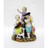 Early 19th century Meissen porcelain figure group of children playing musical instruments, the