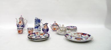 19th century English porcelain part coffee set of Imari design within cobalt blue borders,