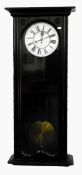 Ebonised single weight Vienna style wall clock the case with cavetto cornice and single glazed door,