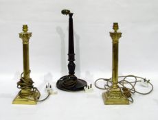 Pair of gilt metal Corinthian column table lamps and a reeded wooden table lamp (3)