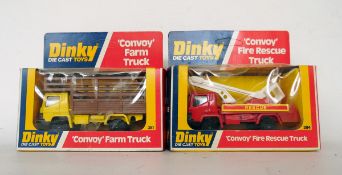 Two Dinky diecast vehicles, 384 fire truck and 381 farm truck, both in unopened boxes (2)