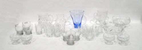 Quantity of cut glassware to include tapering jug with cut star decoration, fruit bowls, jugs,