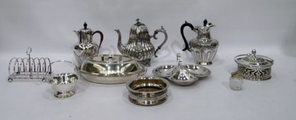 Silver plate teapot, floral pattern, upon raised feet, a coffee pot, another with reeded body, an