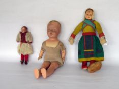 Composition head doll with soft body, wearing felt Dutch costume, 38cm long, another larger