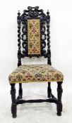 Dark stained oak Carolean style standard chair with carved and pierced crest rail, spiral turned