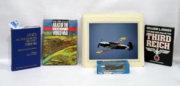 Collection of mounted aeroplane photographs, a Lledo diecast model of a Thrust Supersonic plane