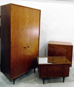 Mid 20th century Heals three piece bedroom suite comprising a two door wardrobe, a dressing chest