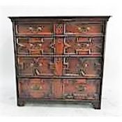 Oak Jacobean chest of four graduated drawers, each with bale handle and geometric mouldings, on