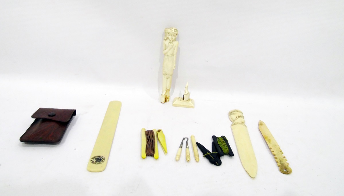 Quantity of small ivory items to include paper knives, figurines, etc