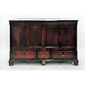 Late18th/early 19th century oak mule chest with four panelled front flanked by reeded quadrant