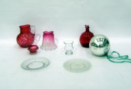 19th century cranberry glass jug of dimpled form, a cranberry decanter, a further salt, lampshade,