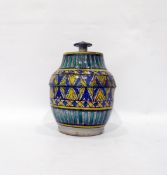 Isnik style stoneware lidded pot of pear-shaped form with overlapping lid, knop handle, decorated in