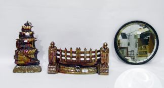 Lustre metal fire fret and companion stand in the form of a galleon and a circular bevelled plate