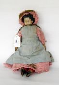 Late 19th century papier mache shoulder head doll with painted hair and features face, soft linen