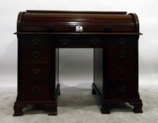 Early 20th century mahogany roll-top desk with well fitted interior of pigeonholes and shallow