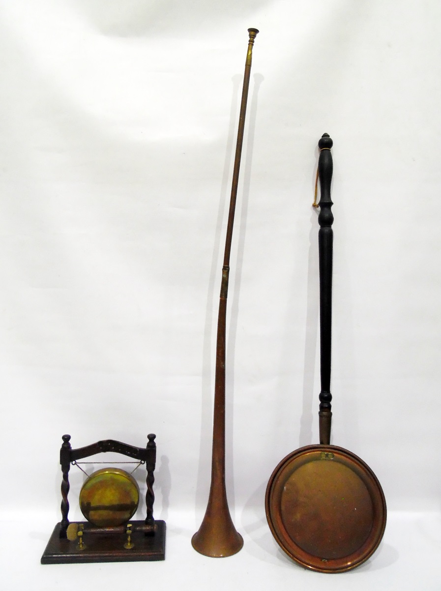 Copper coaching horn, a table gong on oak stand with beater and a copper warming pan (3)