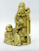 Japanese carved ivory netsuke, carved with sage holding staff and another seated figure