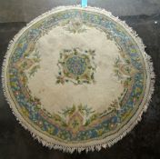 Chinese washed wool rug, pale green ground with oval medallion, allover floral and scroll decorated,