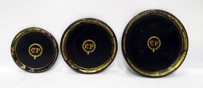19th century Tollware set of three circular trays, with giltwork borders and central initials 'CCP',