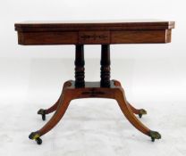 Early 19th century mahogany and crossbanded foldover card table, the top baize lined, raised on twin