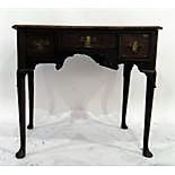 19th century oak lowboy having an arrangement of three drawers, on straight cabriole supports and