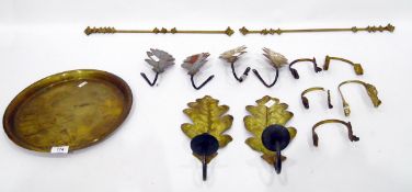 Circular brass tray, a pair of brass curtain hooks, two brass rods with hooks, a pair of brass