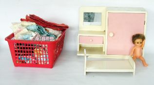 Mid 20th century plastic model of Amanda Jane, a quantity of clothing, doll's bed covers, etc and