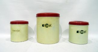 Three vintage tin storage canisters, various sizes, for sugar and plain flour