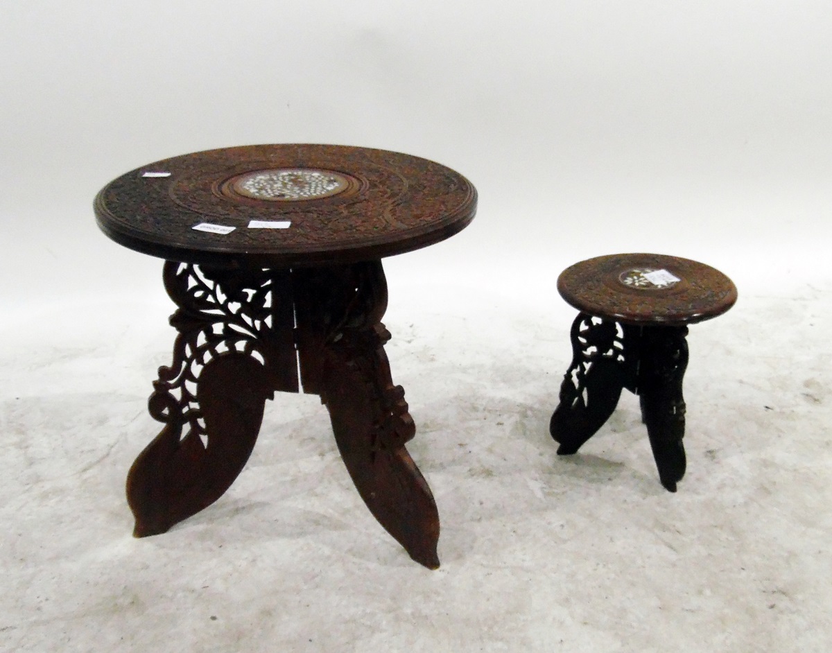 Two Anglo-Indian hardwood tables/stools with bone inlay, pierced and carved tripod supports