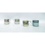 Collection of four 18th century porcelain coffee cans including three panelled design, each with