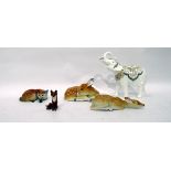 Beswick model of fox, two Russian pottery models of fawns, further fox model, 7.5cm high and a