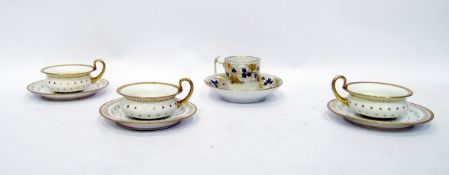 18th century Crown Derby coffee can and saucer, white ground with gilt and underglaze blue vine