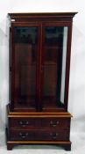 Modern mahogany display cabinet enclosed by two be