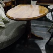 Oval modern pine pedestal kitchen table on turned