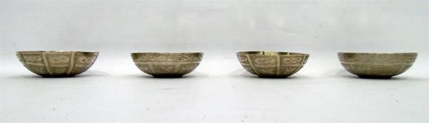 Two pairs of foreign silver-coloured metal nut bow