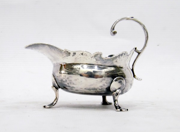 George II silver sauceboat of squat form with cut